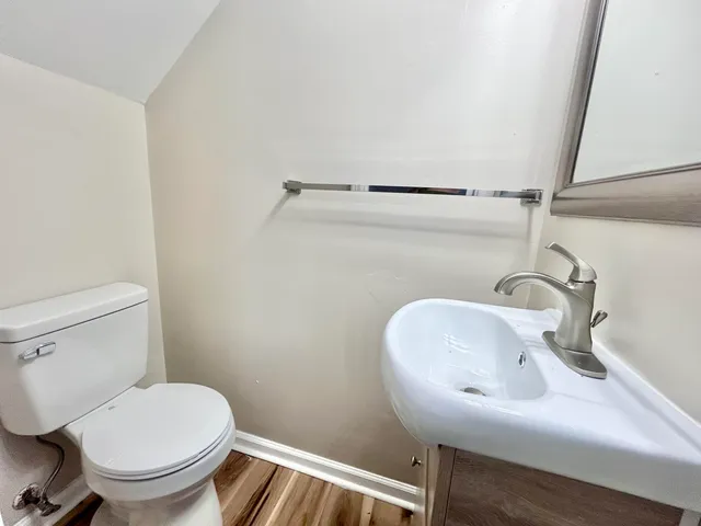 a bathroom with a sink and a toilet
