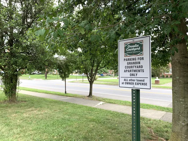 a sign on the side of the park