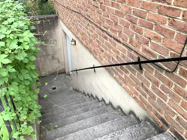 a view of balcony with wooden floor