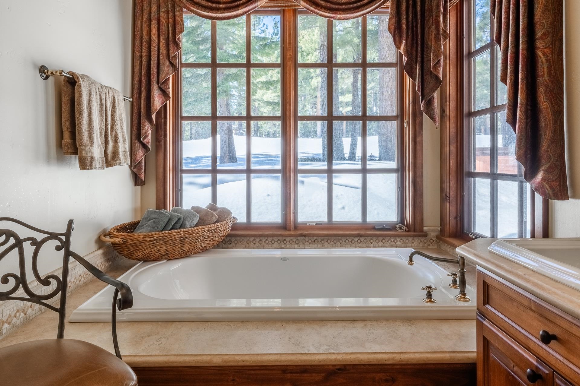 105 Northstar Circle Mammoth Lakes, CA 93546 - Photo 24 of 49 a bathroom with a bathtub and a window