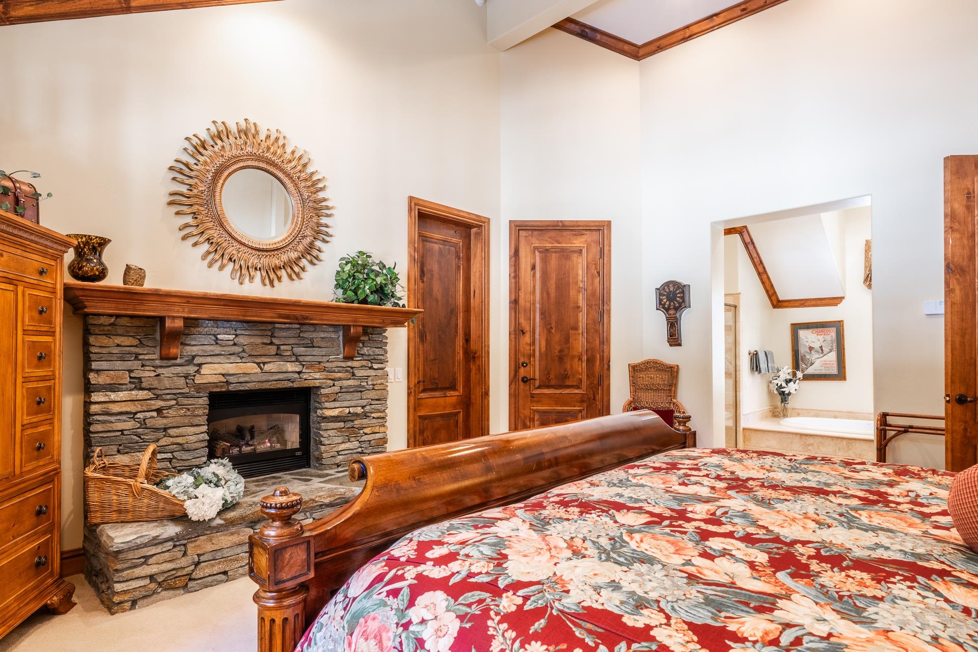 105 Northstar Circle Mammoth Lakes, CA 93546 - Photo 26 of 49 a bedroom with a bed and a fireplace