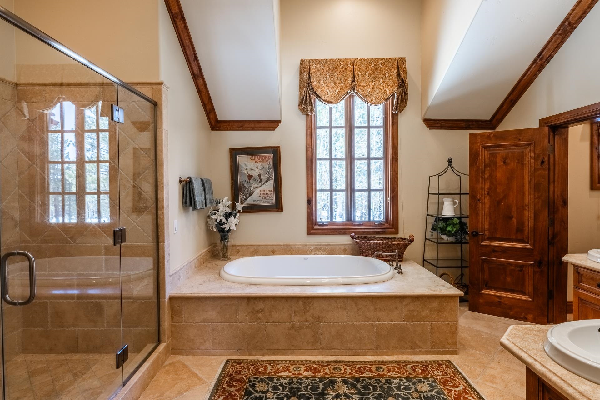 105 Northstar Circle Mammoth Lakes, CA 93546 - Photo 27 of 49 a bathroom with a tub a sink and a shower