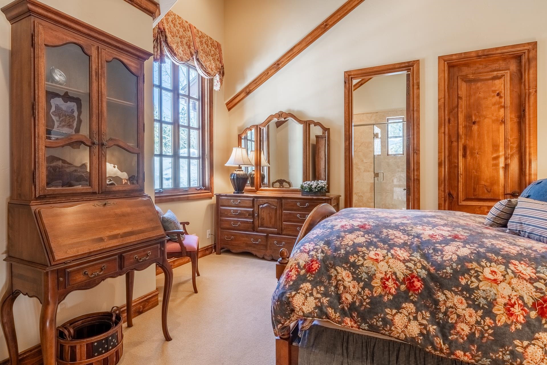 105 Northstar Circle Mammoth Lakes, CA 93546 - Photo 30 of 49 a bedroom with a bed and wooden floor