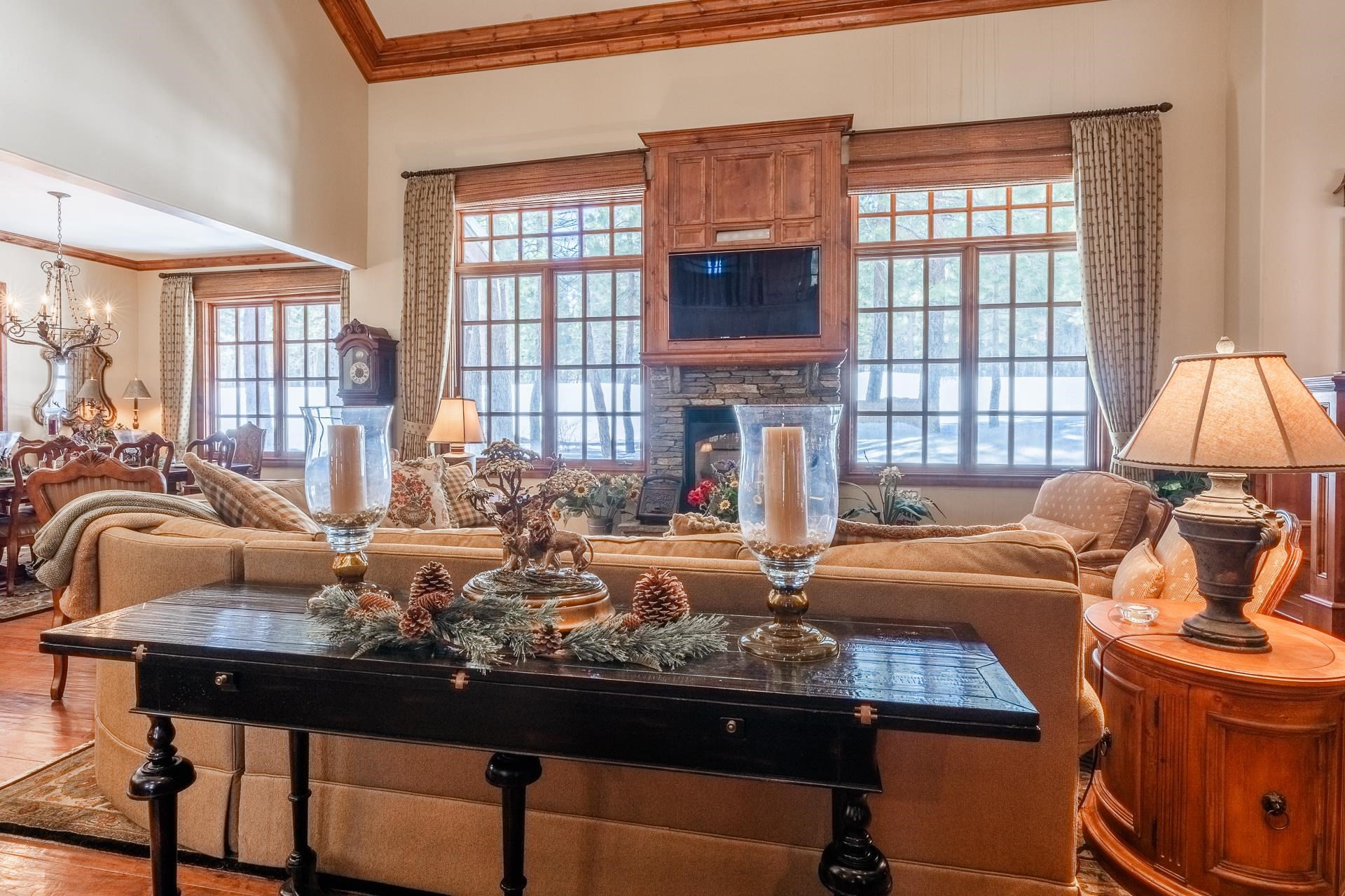 105 Northstar Circle Mammoth Lakes, CA 93546 - Photo 3 of 49 a living room with furniture and a flat screen tv