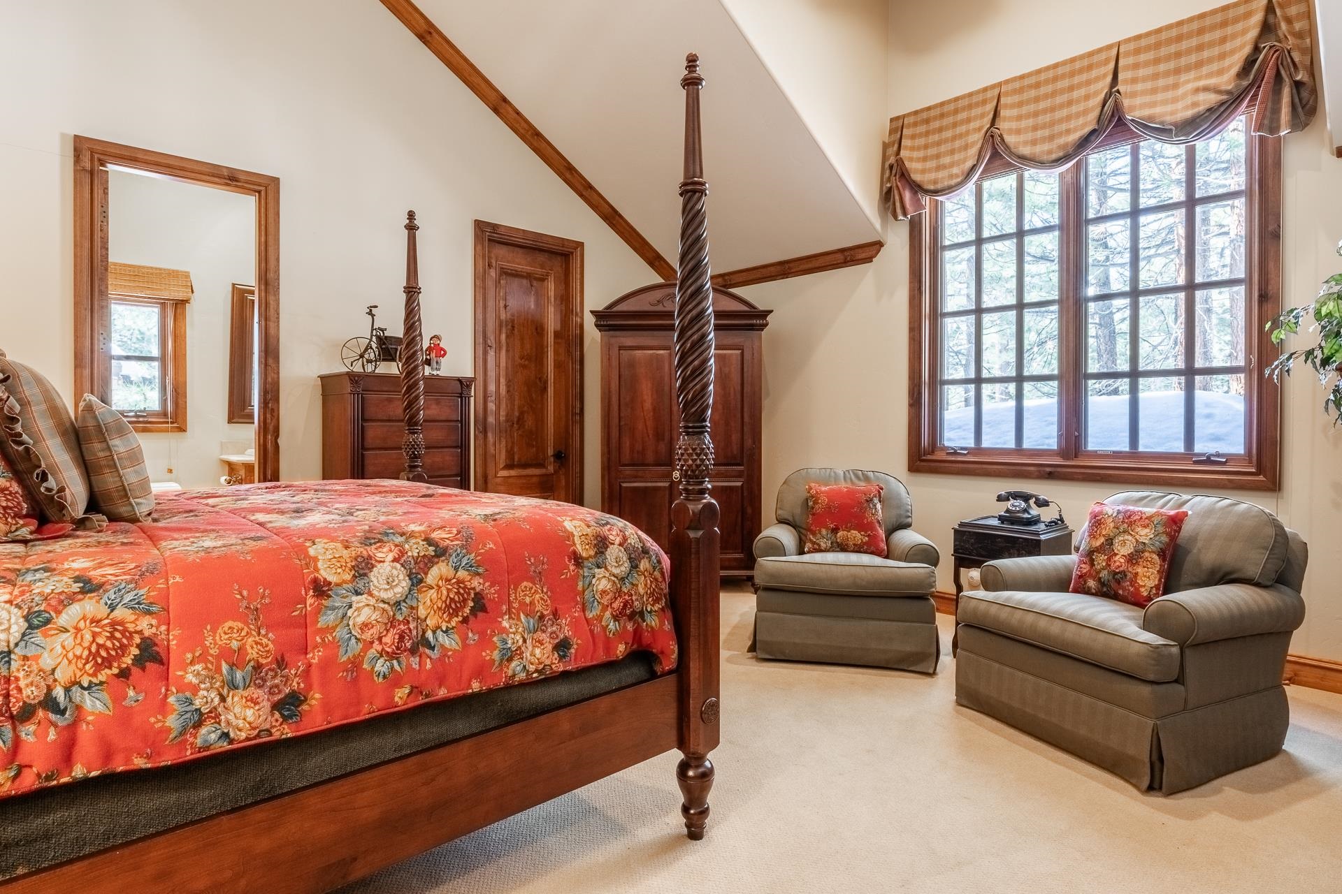 105 Northstar Circle Mammoth Lakes, CA 93546 - Photo 33 of 49 a bedroom with bed couch and window