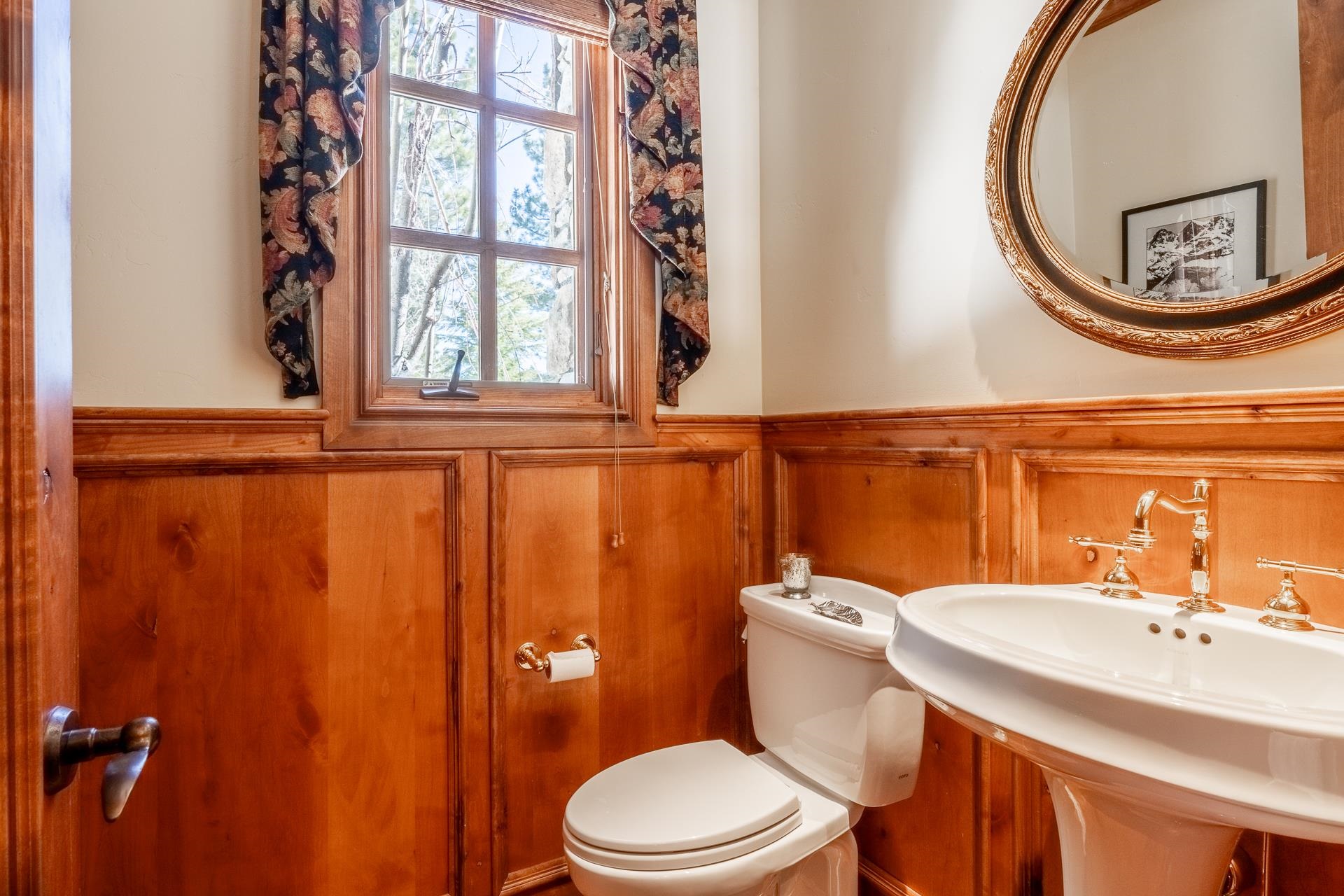 105 Northstar Circle Mammoth Lakes, CA 93546 - Photo 43 of 49 a bathroom with a sink a toilet and a mirror