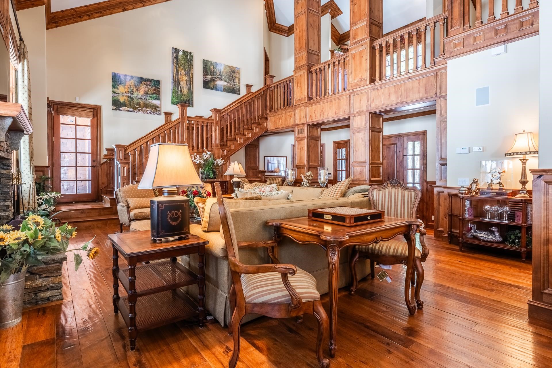 105 Northstar Circle Mammoth Lakes, CA 93546 - Photo 5 of 49 a dining room with furniture a chandelier and wooden floor