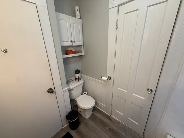 a kitchen with a stove a sink and a refrigerator