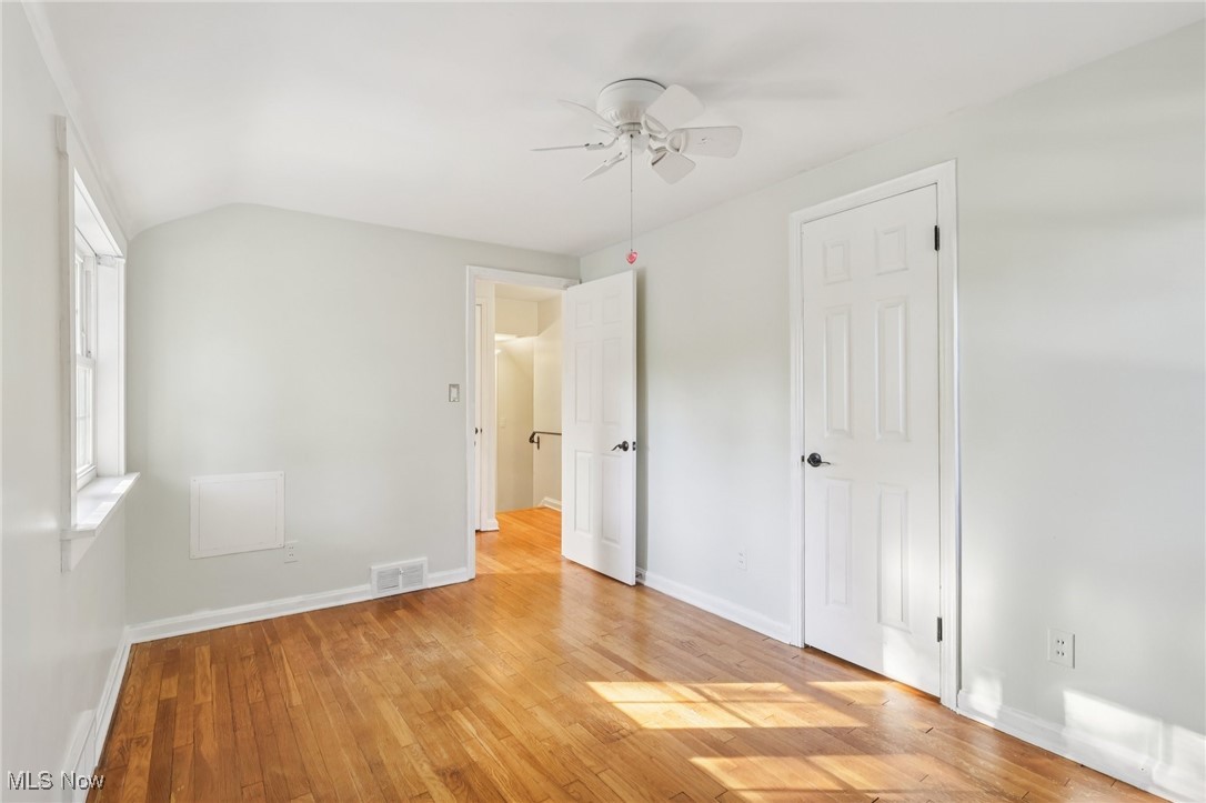 1151 Croyden Road Lyndhurst, OH 44124 - Photo 29 of 37 bedroom featuring light wood-style floors, vaulted ceiling, and ceiling fan