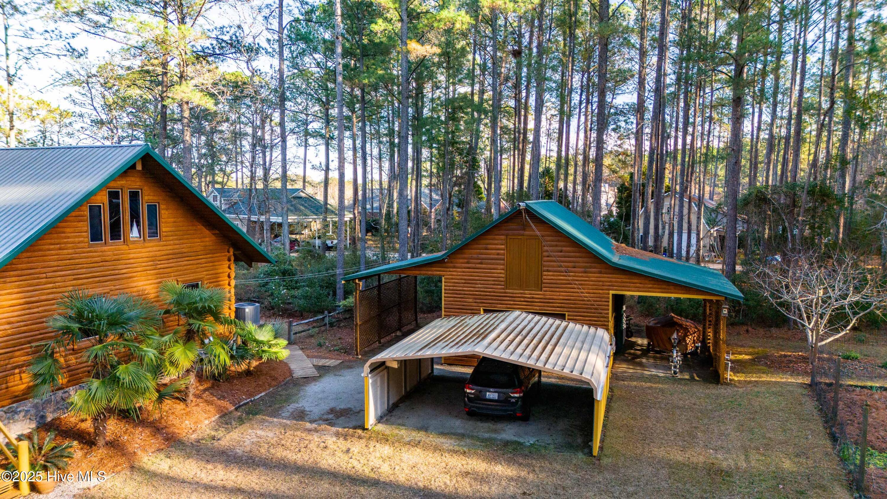 128 Fork Point Road Oriental, NC 28571 - Photo 3 of 54 003_Carport & Workshop