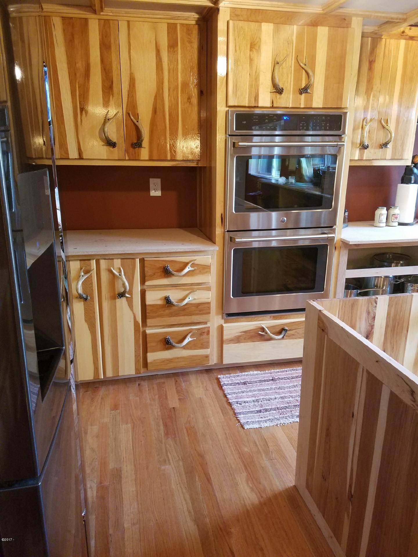 2970 Northeast East Devils Lake Road Otis, OR 97368 - Photo 6 of 12 Custom hardwood cabinets