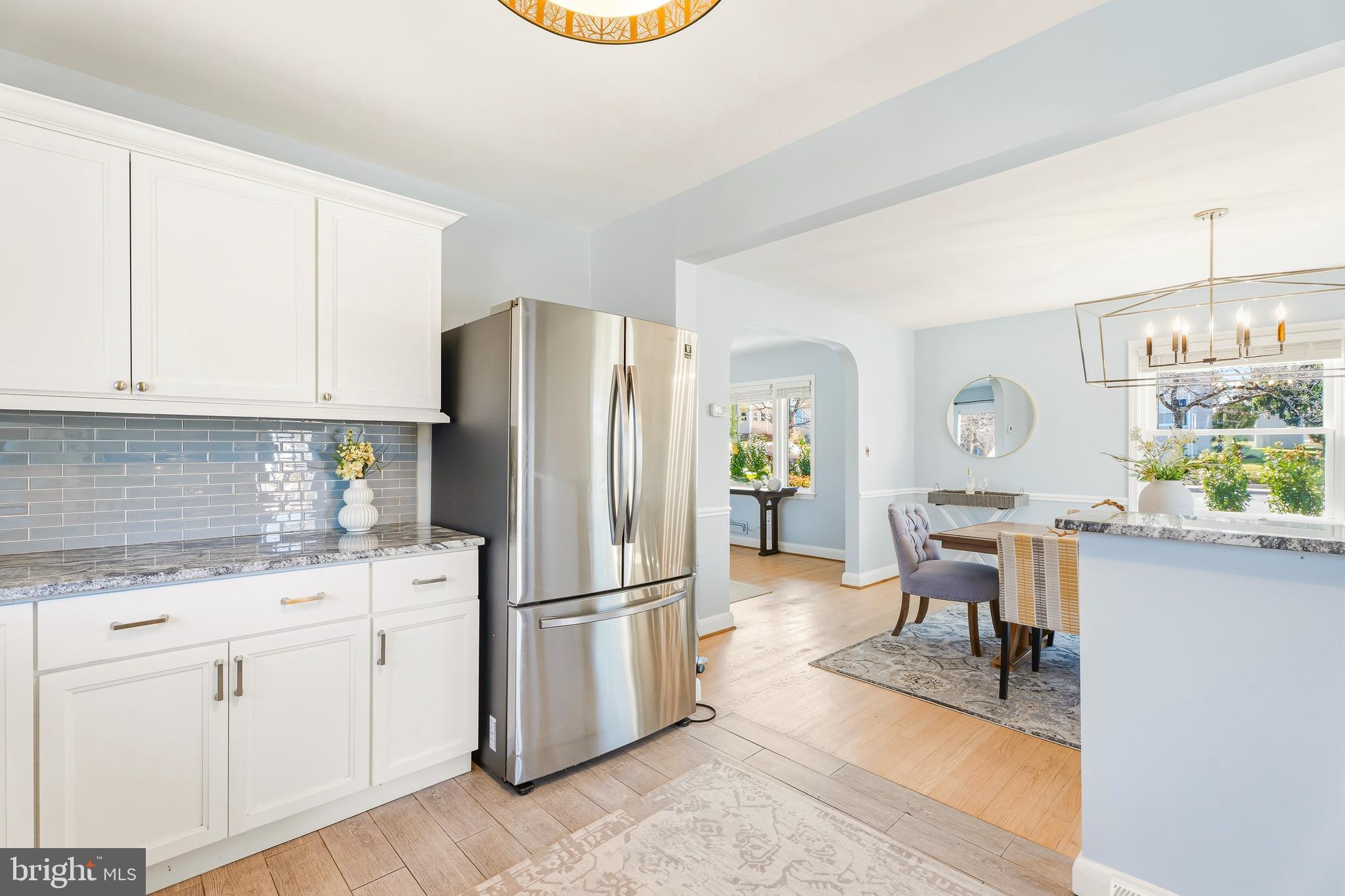 500 Hillen Road Towson, MD 21286 - Photo 11 of 42 a kitchen with appliances cabinets and a counter top space