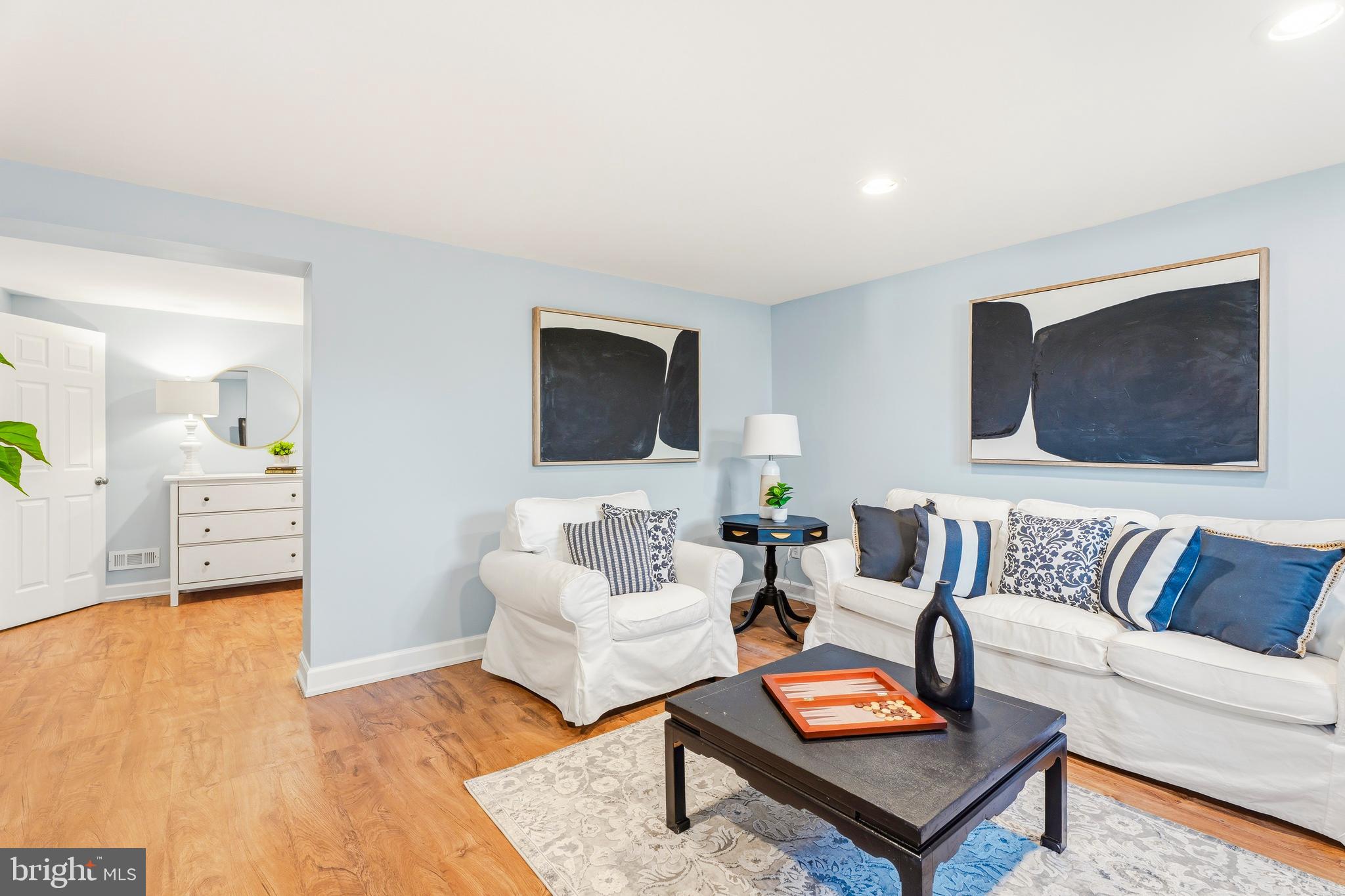 500 Hillen Road Towson, MD 21286 - Photo 26 of 42 a living room with furniture and a flat screen tv