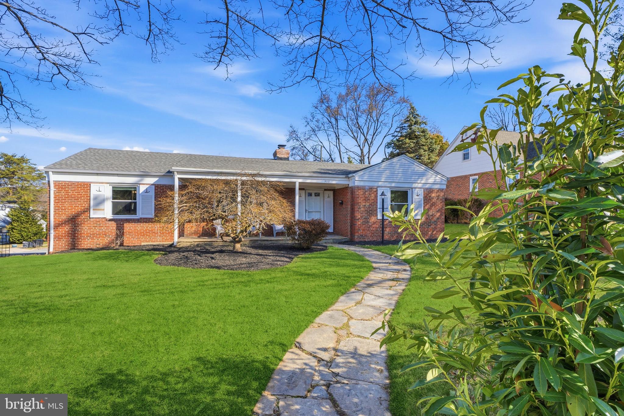 500 Hillen Road Towson, MD 21286 - Photo 40 of 42 a view of a house with backyard sitting area and garden
