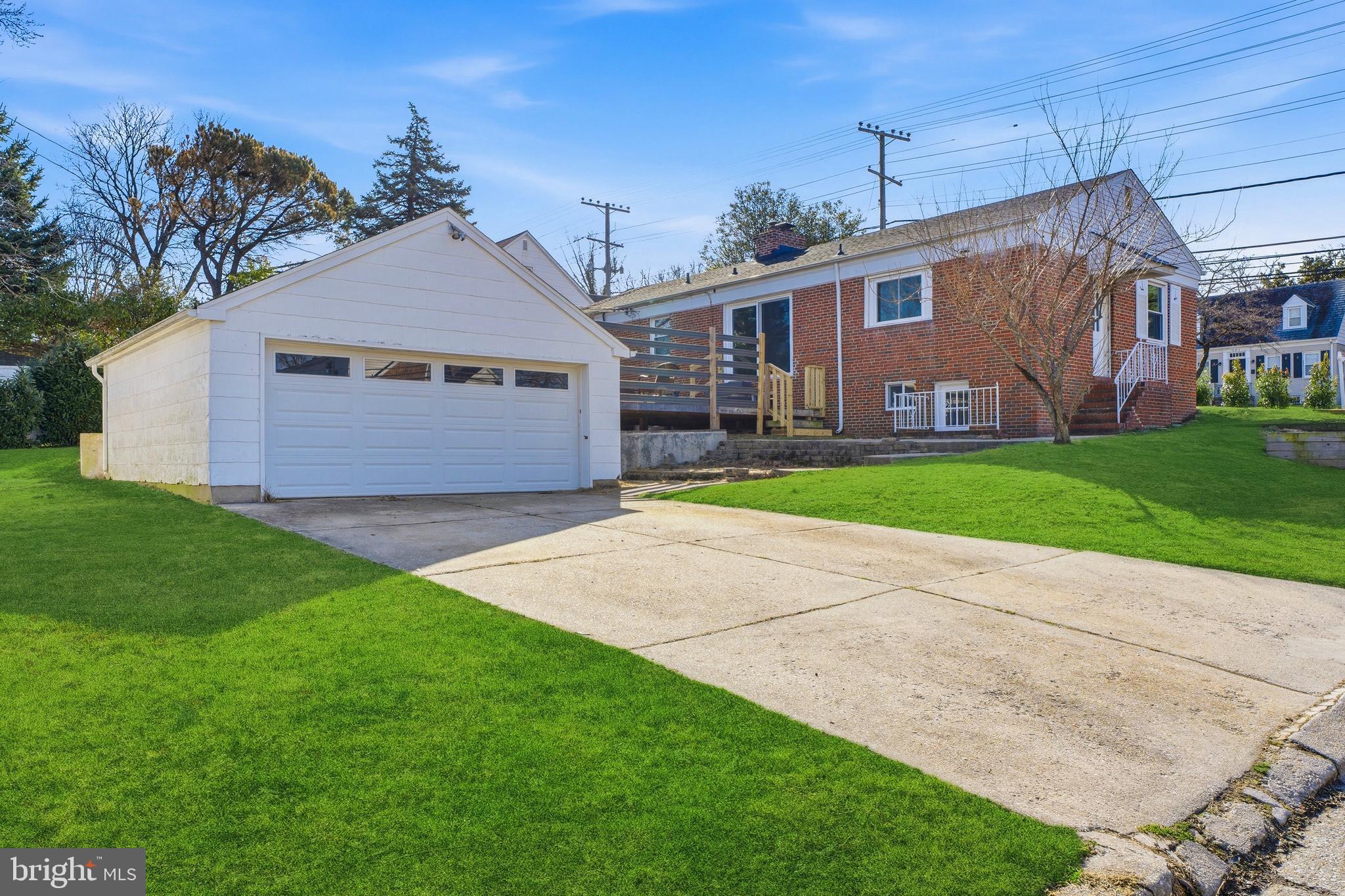 500 Hillen Road Towson, MD 21286 - Photo 42 of 42 a front view of house with yard and garage