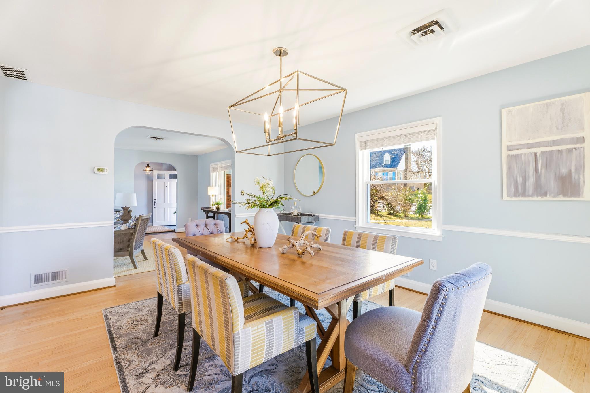 500 Hillen Road Towson, MD 21286 - Photo 8 of 42 a view of a dining room with furniture window and wooden floor