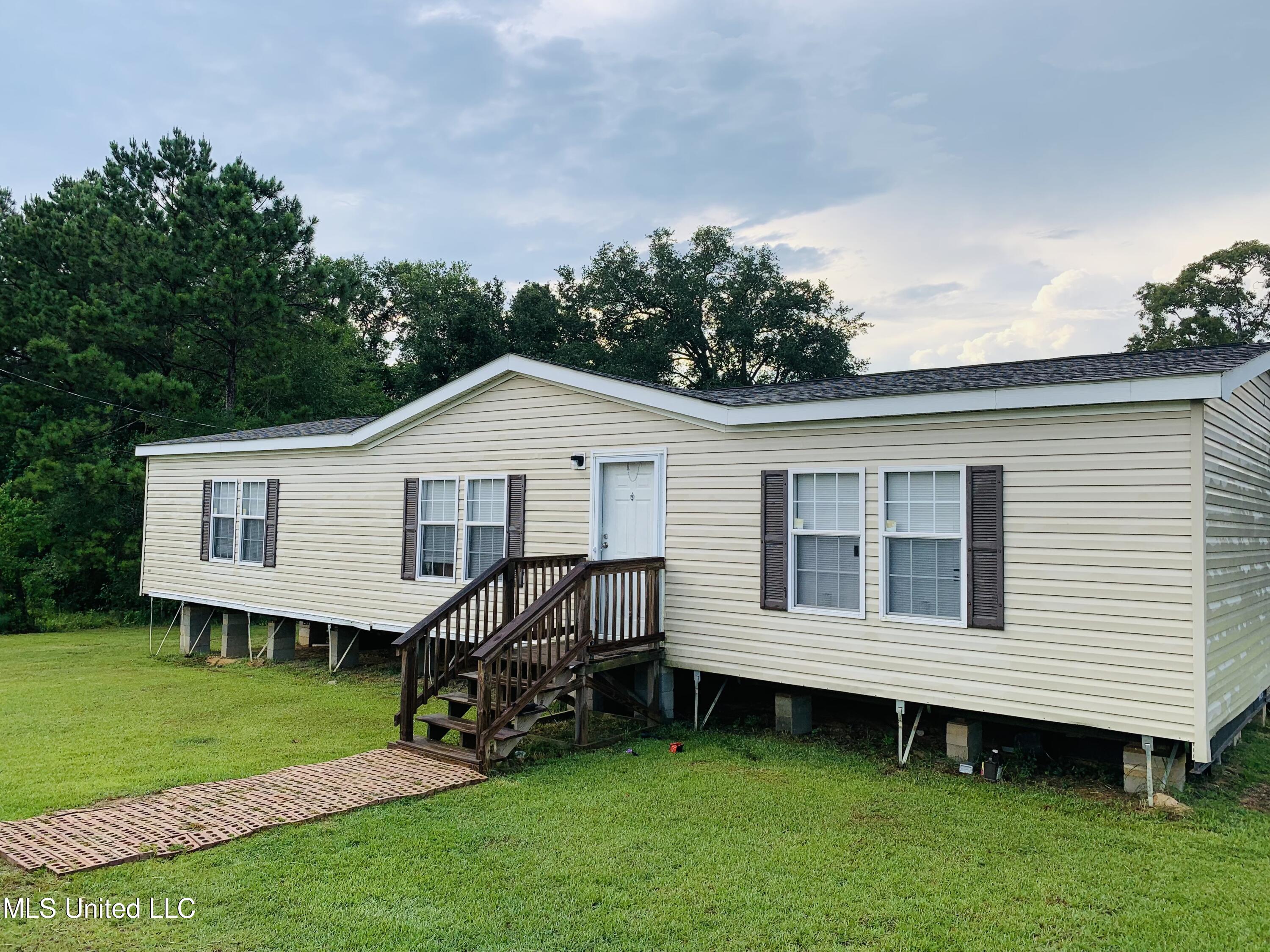 22390 L Lizana Road Saucier, MS 39574 - Photo 1 of 9 Extfrnt1