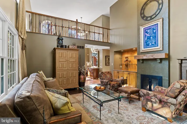 a kitchen with stainless steel appliances granite countertop a stove and cabinets