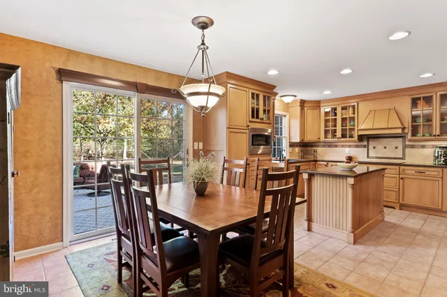 a spacious bathroom with double vanity a mirror a sinks a vanity and a shower