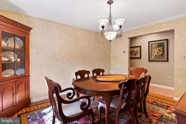 a view of a workspace with furniture