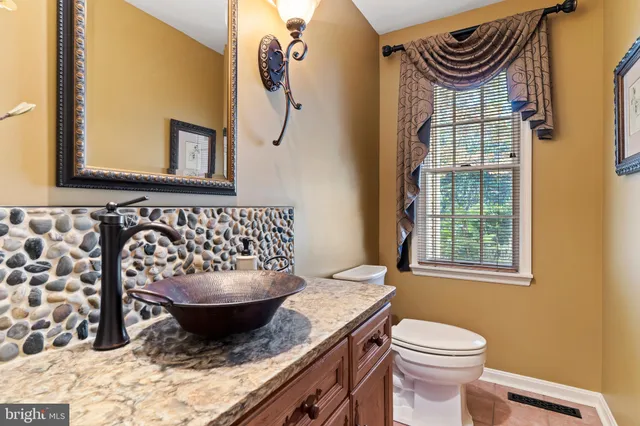 an aerial view of residential house and trees
