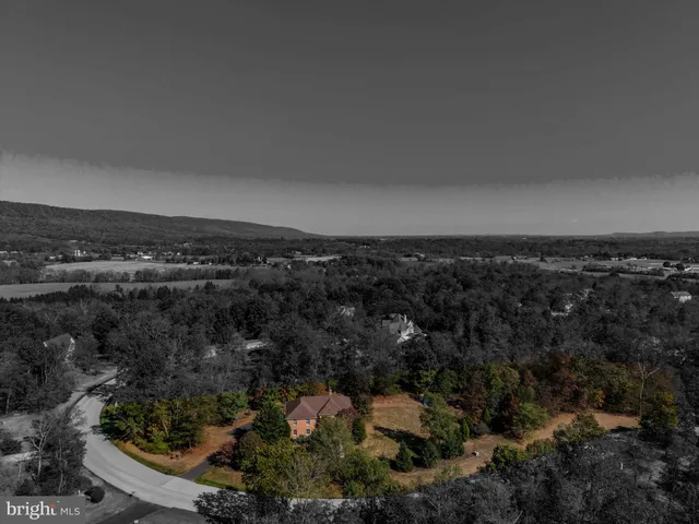 a view of a table and chairs in the patio