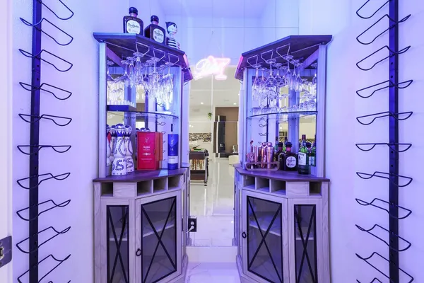 a bathroom with a double vanity sink and a mirror