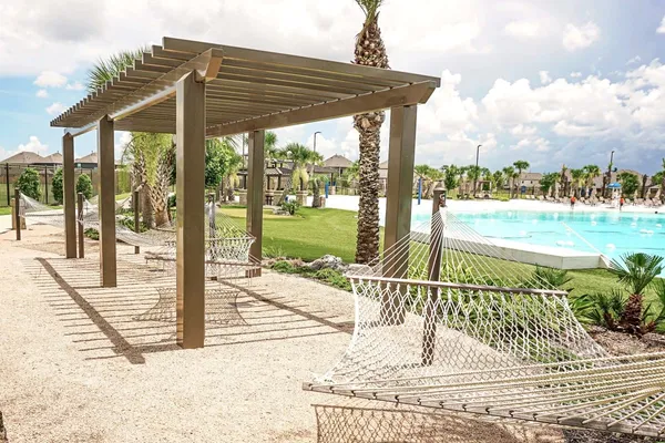a view of a swimming pool and deck