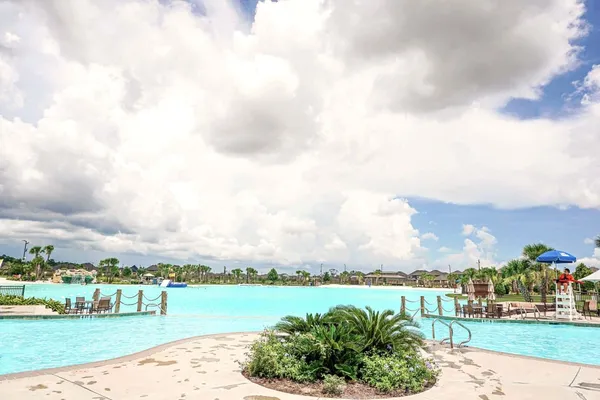 a view of a lake with a big yard