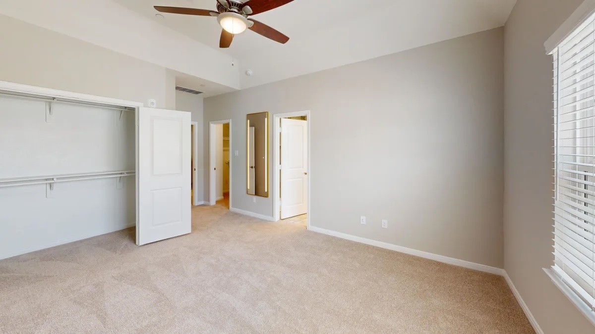 12400 Greens Road, Unit 1102 Atascocita, TX 77346 - Photo 8 of 23 a view of an empty room with a window