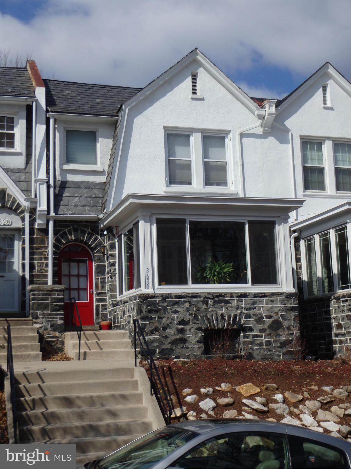 3630 Yolando Road Baltimore, MD 21218 - Photo 1 of 20 a front view of a house with street