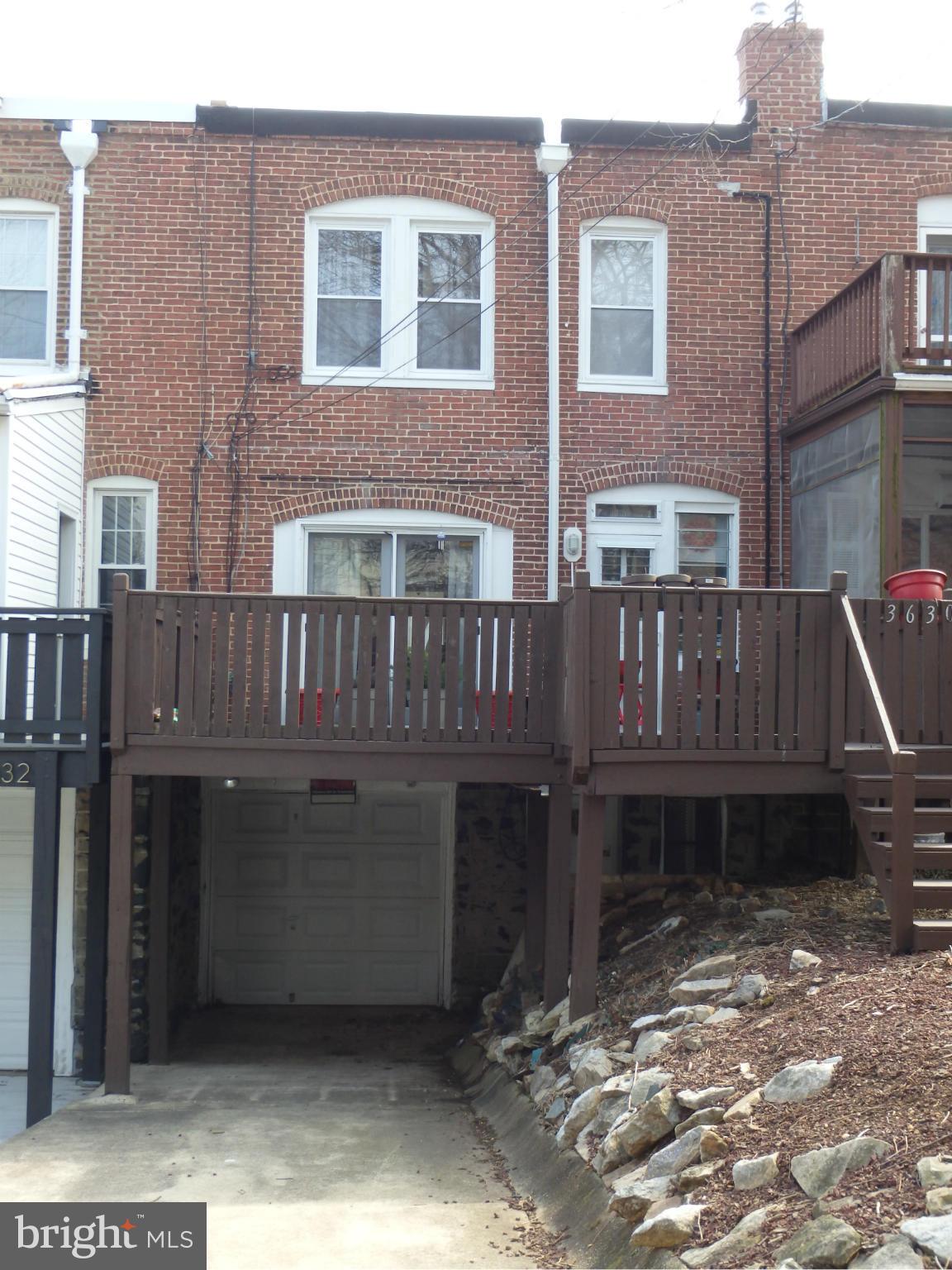 3630 Yolando Road Baltimore, MD 21218 - Photo 16 of 20 a view of a house with wooden fence