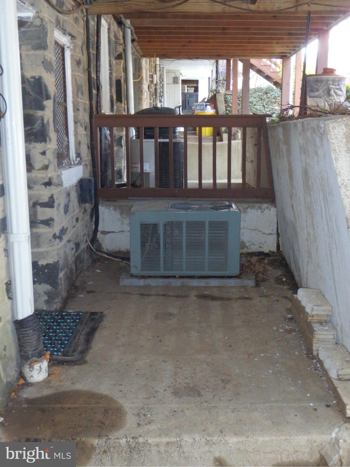 3630 Yolando Road Baltimore, MD 21218 - Photo 20 of 20 a view of a porch with a floor to ceiling window