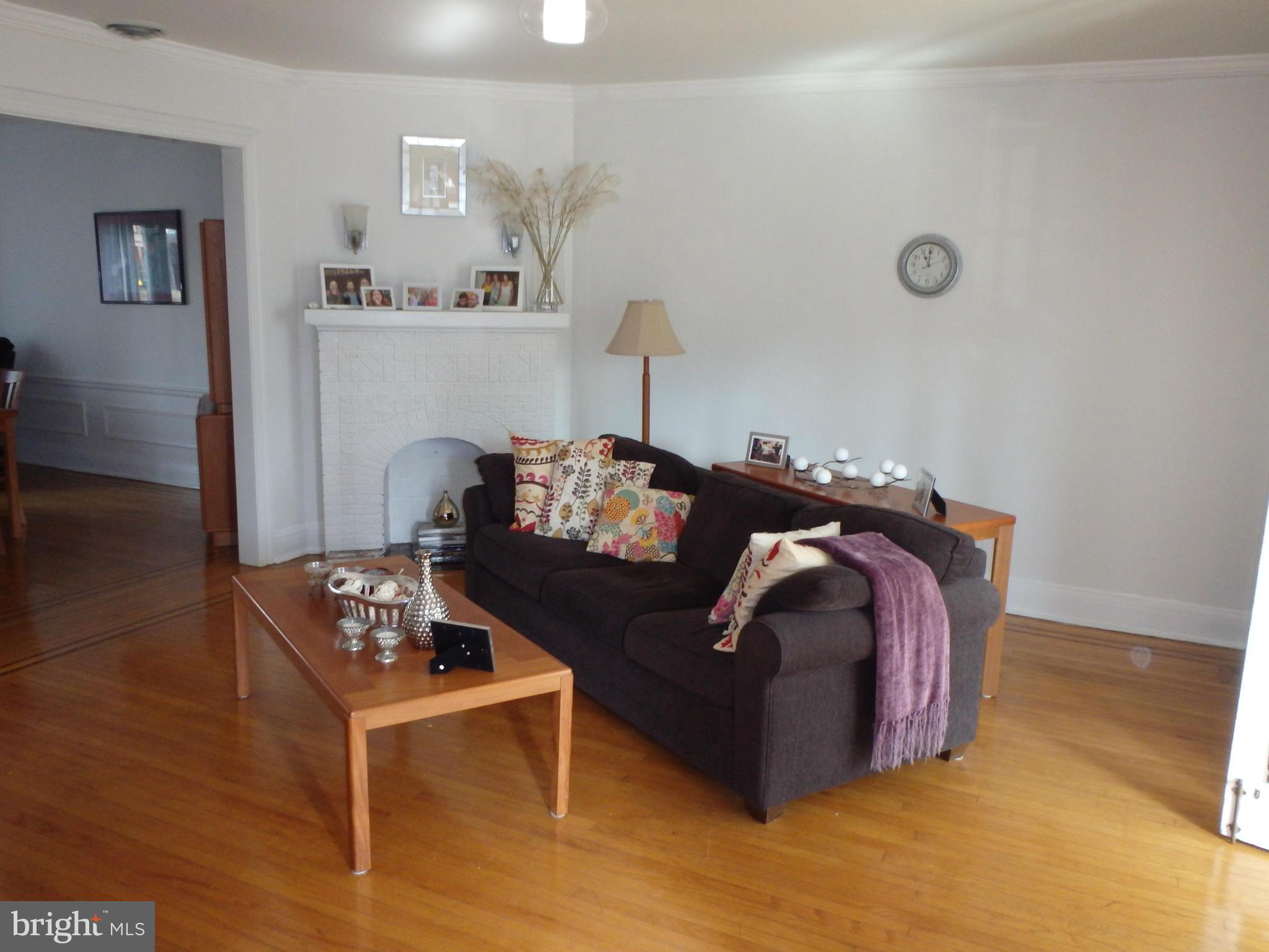 3630 Yolando Road Baltimore, MD 21218 - Photo 4 of 20 a living room with furniture and a couch