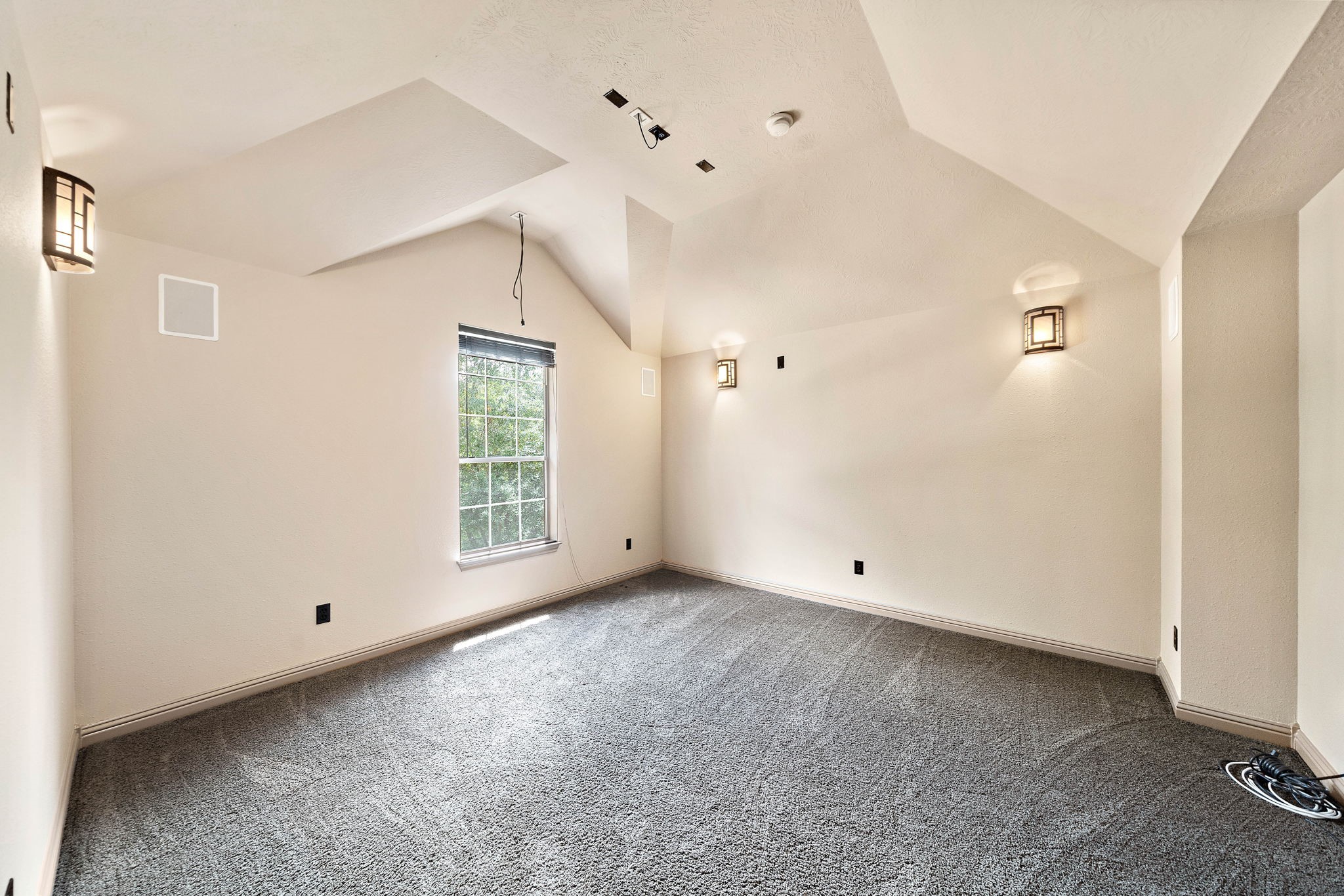 10015 Cinco Ridge Drive Katy, TX 77494 - Photo 11 of 17 a view of an empty room with a window