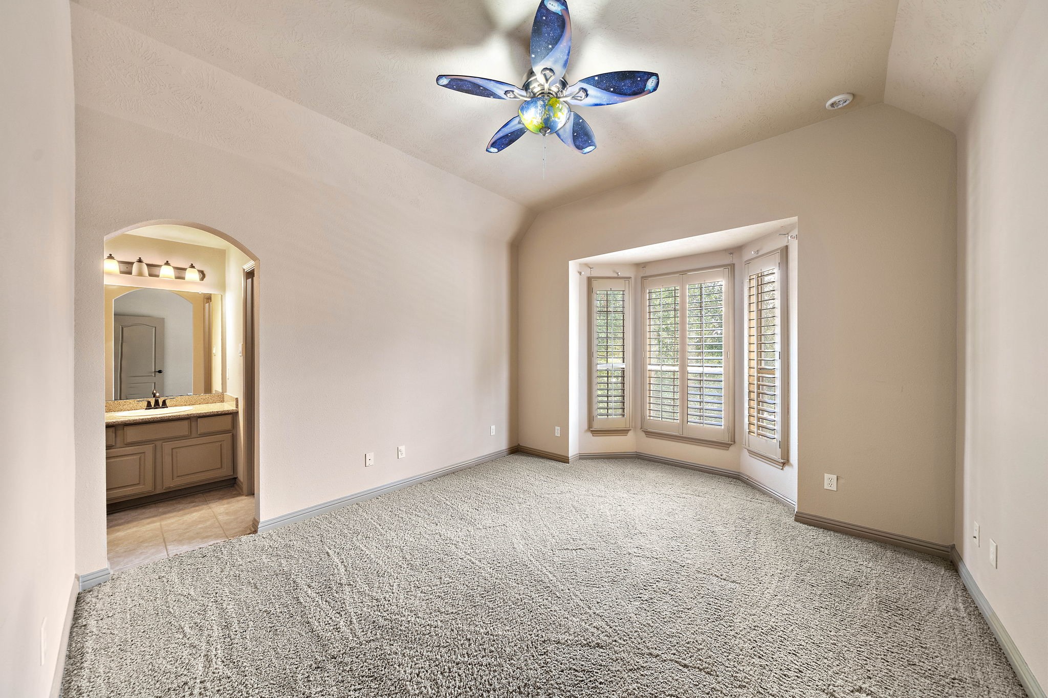 10015 Cinco Ridge Drive Katy, TX 77494 - Photo 14 of 17 wooden floor in an empty room with a window