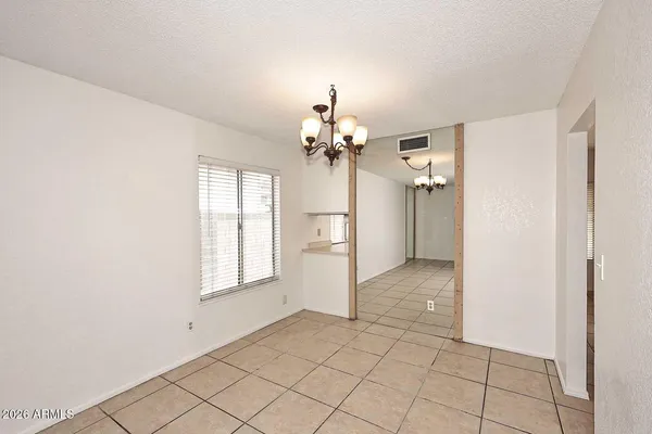 a view of a storage & utility room with a sink