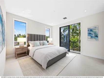 a bedroom with a large bed and a large window