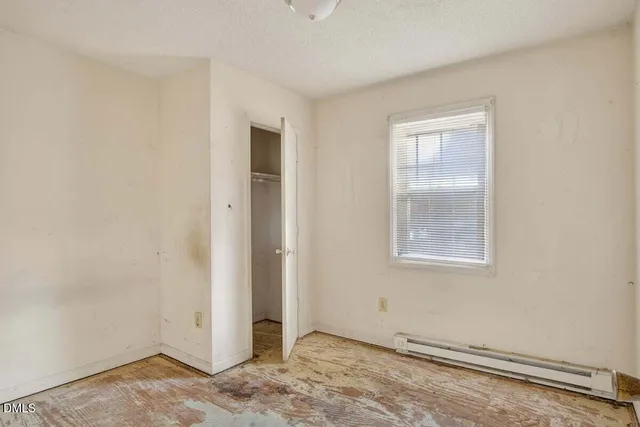 an empty room with windows