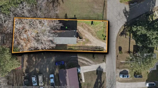 a view of balcony with wooden floor and fence