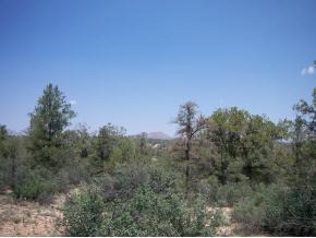 15325 North Talking Rock Ranch Road Prescott, AZ 86305 - Photo 5 of 7 a view of a city and trees in a field