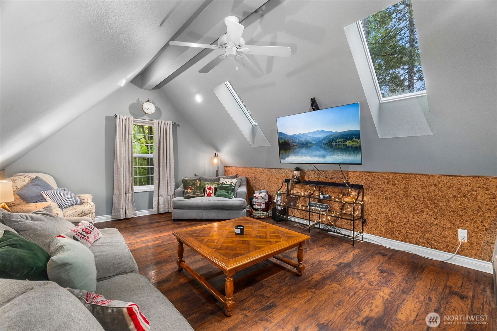 1130 East Sunset Hill Road Shelton, WA 98584 - Photo 30 of 40 a living room with furniture and wooden floor