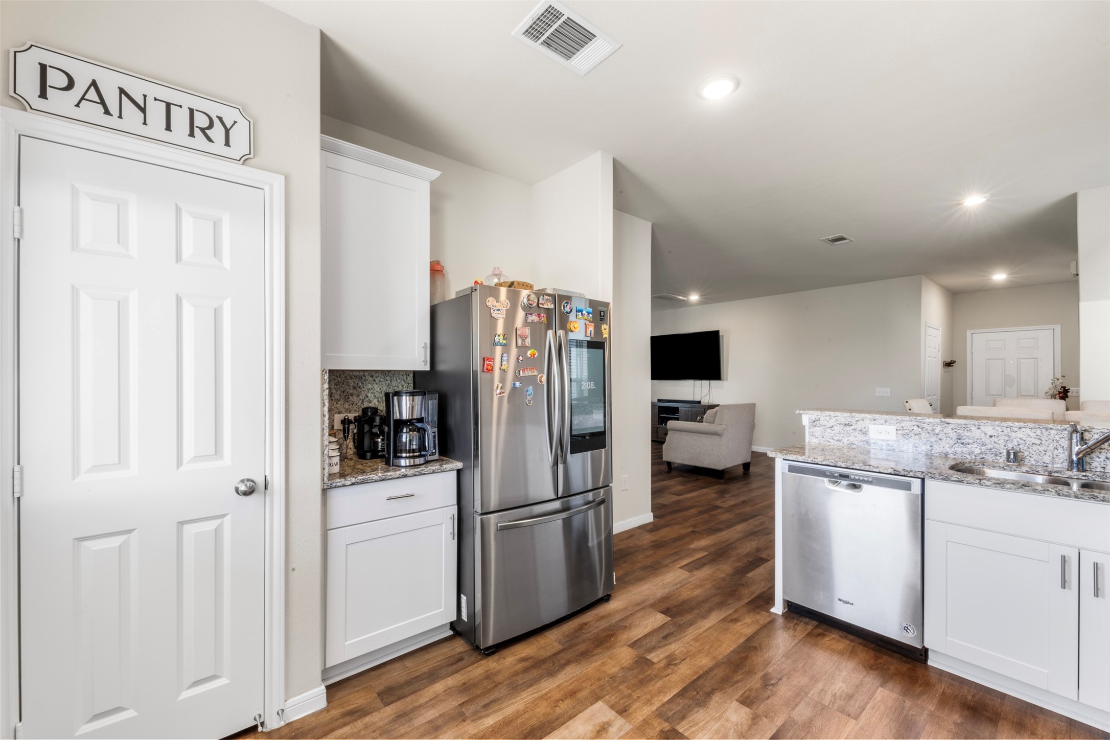 4611 Prairie Chase Drive Houston, TX 77069 - Photo 14 of 44 a kitchen with a refrigerator and microwave