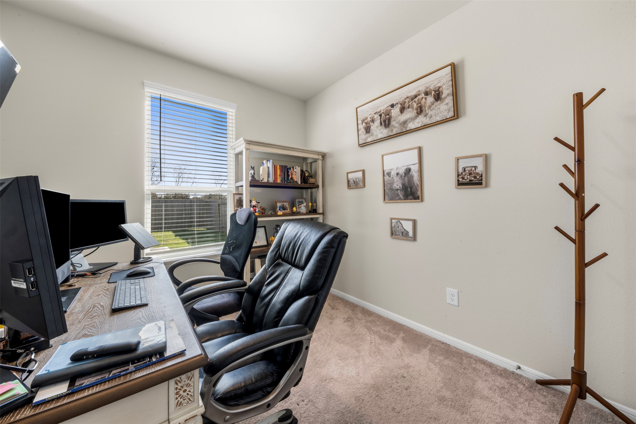 4611 Prairie Chase Drive Houston, TX 77069 - Photo 16 of 44 a view of workspace with wooden floor windows