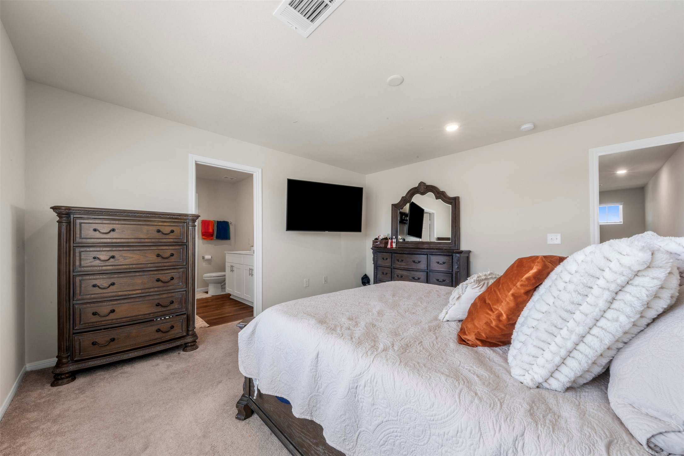 4611 Prairie Chase Drive Houston, TX 77069 - Photo 18 of 44 a bedroom with a bed and a television