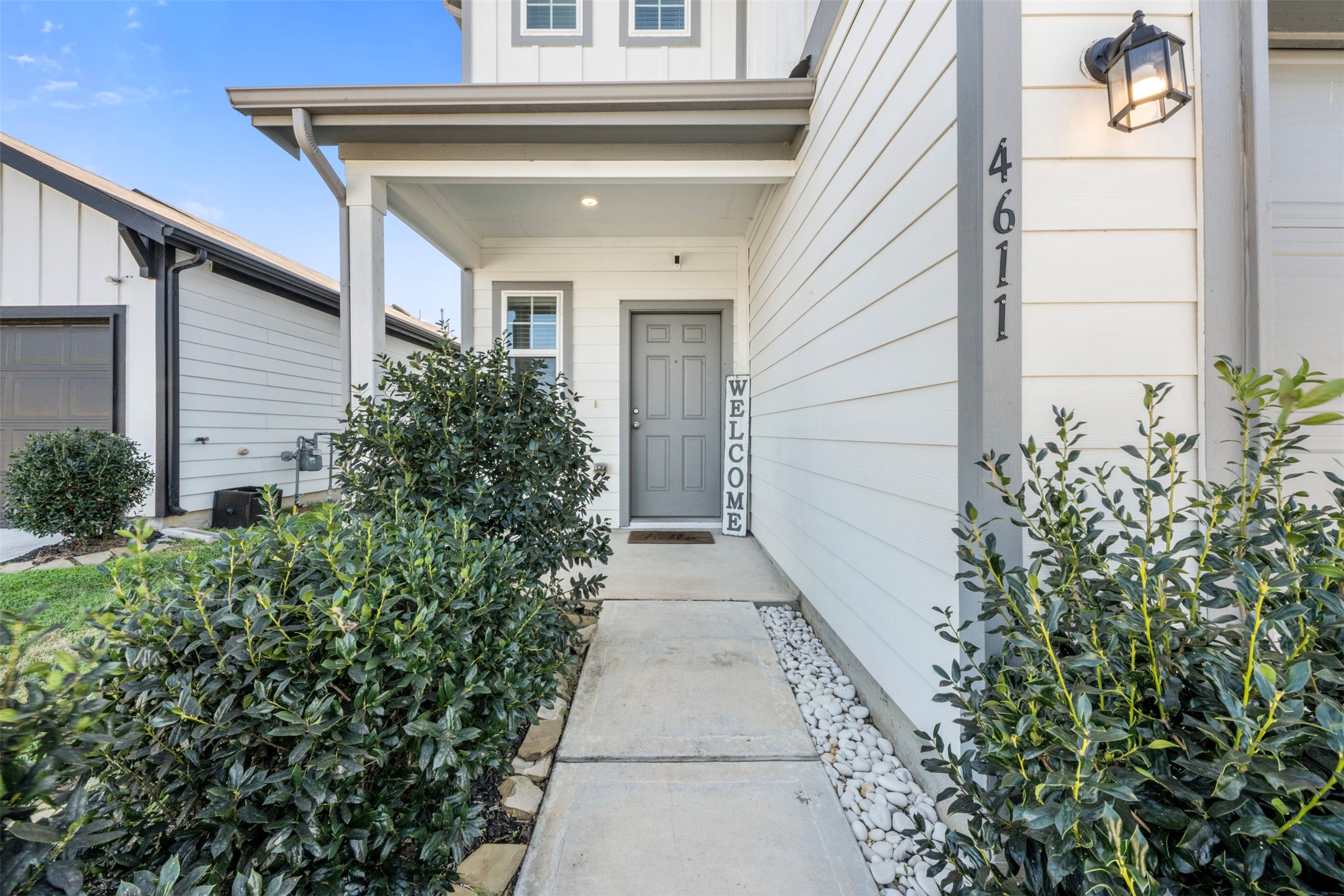 4611 Prairie Chase Drive Houston, TX 77069 - Photo 2 of 44 a view of a pathway along with potted plants