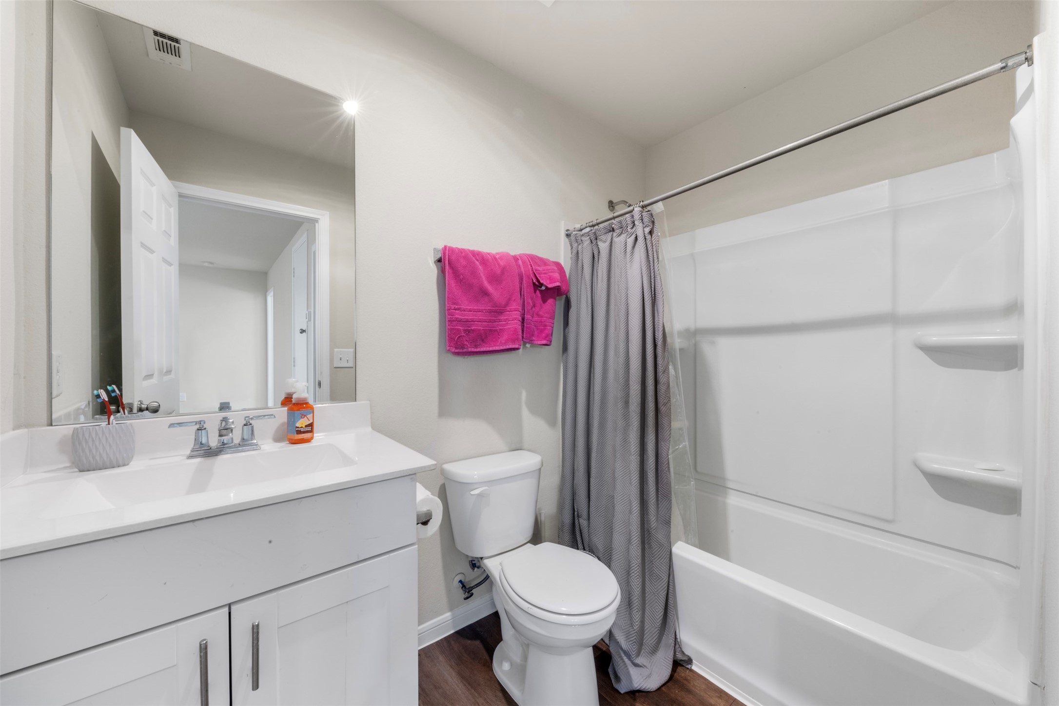 4611 Prairie Chase Drive Houston, TX 77069 - Photo 21 of 44 a bathroom with a sink toilet vanity and shower