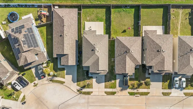 a view of living room with furniture and large window