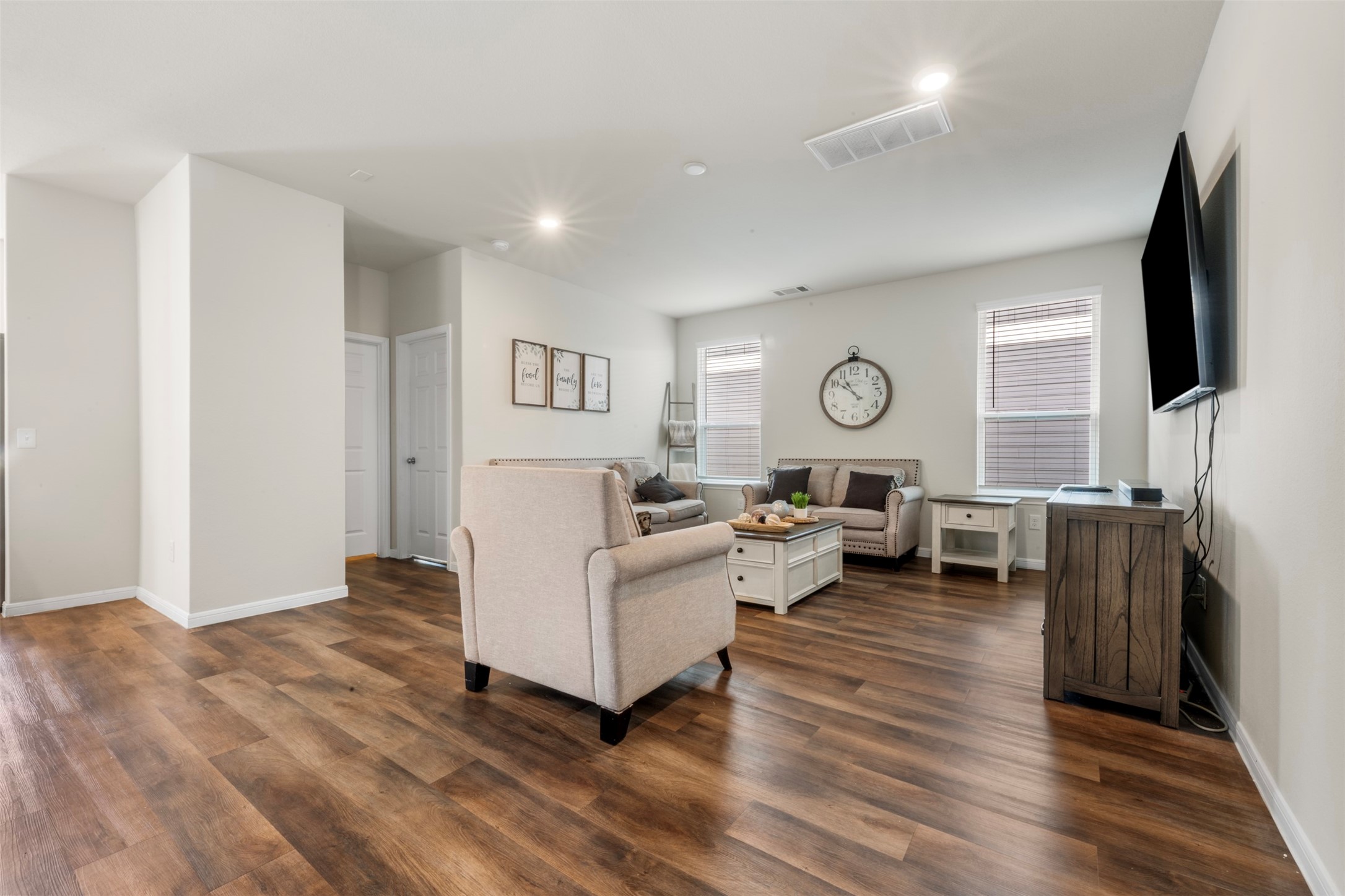 4611 Prairie Chase Drive Houston, TX 77069 - Photo 4 of 44 a living room with fireplace furniture and a flat screen tv