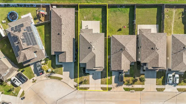 a view of living room with furniture and large window